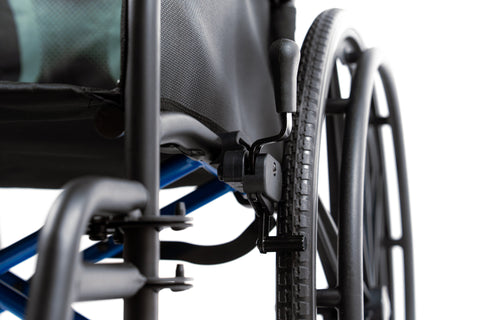 Close-up of the ErgoSteel wheel lock lever beside the rear tire, with the blue steel cross-brace behind it