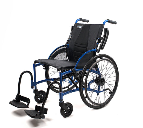 Strongback Comfort Flip wheelchair from the front three-quarter with the near armrest flipped back and up, leaving the side of the seat clear for a sideways transfer