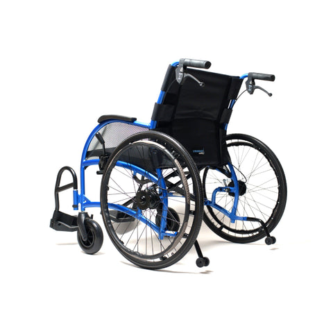 Strongback Comfort wheelchair from the rear three-quarter, showing both 24 inch quick-release rear wheels, the seat and the swing-away legrests