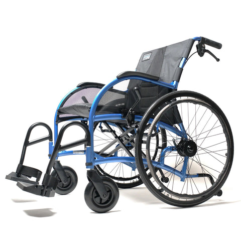 Strongback Heavy Duty wheelchair in blue, front three-quarter view on a white background, showing the wide seat, mesh backrest and 24 inch rear wheels